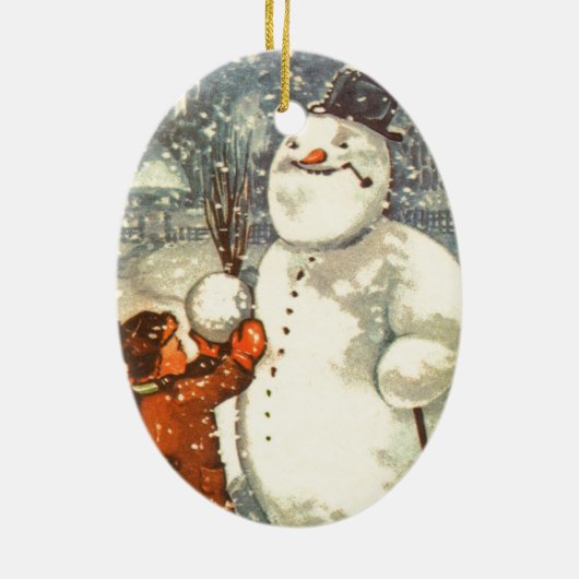 雪だるまのクリスマスツリーのオーナメントを持つエストニア語の男の子 セラミックオーナメント (裏面)