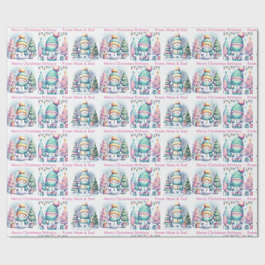 雪だるまのパーソナライズされたピンクの名前の女の子のクリスマス ラッピングペーパー (フラット)