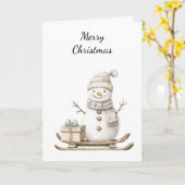 雪だるまオンSkisクリスマス カード (黄色い花)