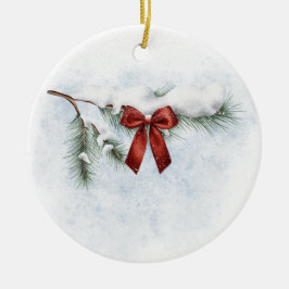 雪で覆われた松の枝でフェスティバルの赤い弓 セラミックオーナメント