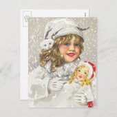雪に人形をビクトリアン持つヴィンテージクリスマスガール シーズンポストカード (正面/裏面)