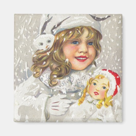 雪に人形をビクトリアン持つヴィンテージクリスマスガール マグネット (正面)