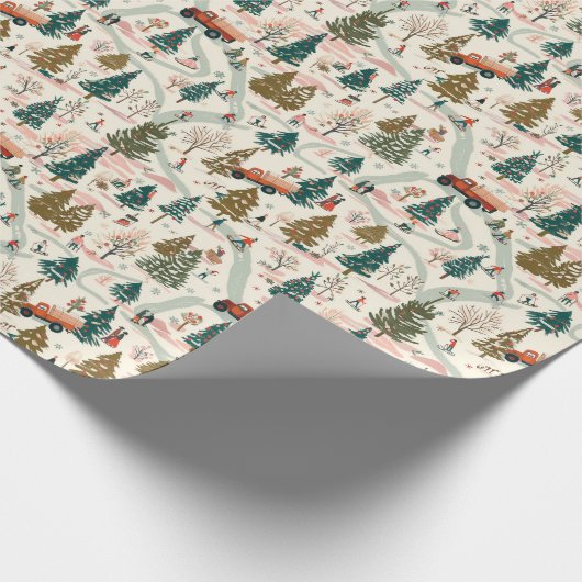 雪に覆われた冬のクリスマスビレッジの赤いトラック ラッピングペーパー (角)