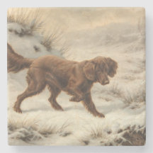 雪に覆われた冬の風景に登場するゴードン・セッター犬