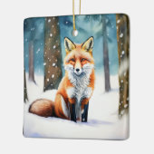 雪に覆われた森のかわいいキツネ セラミックオーナメント (左)