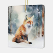 雪に覆われた森のかわいいキツネ セラミックオーナメント (左)