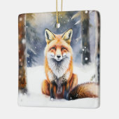 雪に覆われた森のかわいいキツネ セラミックオーナメント (左)