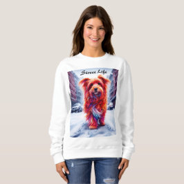 雪に覆われた白失ったい街路のかわいい野良犬 スウェットシャツ