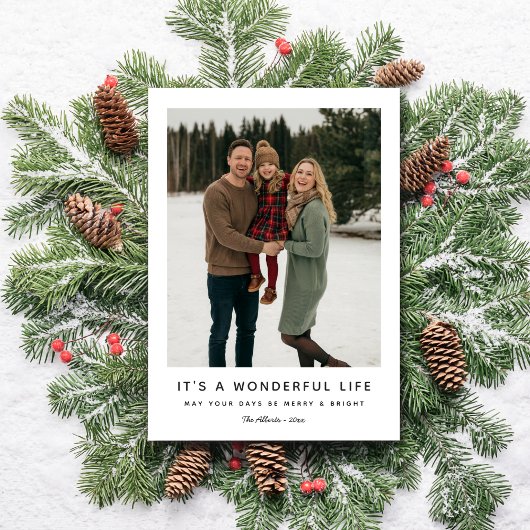 雪に覆われた素晴らしいクリスマスの家族の写真 シーズンカード