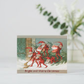 雪のおもしろい中を吹き飛ぶ赤いクリスマス小人 シーズンポストカード (スタンド正面)