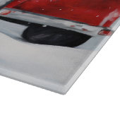 雪のクリスマスにアイルランドの赤いセッター犬 カッティングボード (角)