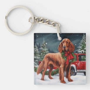 雪のクリスマスにアイルランドの赤いセッター犬 キーホルダー