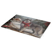 雪のクリスマスにアラスカンマラムート犬 カッティングボード (角)