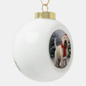 雪のクリスマスにウィートテリア犬 セラミックボールオーナメント (左)