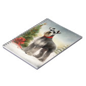 雪のクリスマスにシュナウザー犬 ノートブック (左側)