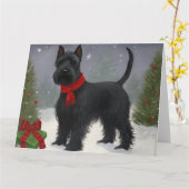 雪のクリスマスにスコットランドのテリア犬 カード (黄色い花)