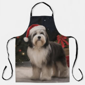 雪のクリスマスにチベットテリア犬 エプロン (正面)
