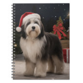 雪のクリスマスにチベットテリア犬 ノートブック (正面)