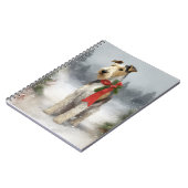 雪のクリスマスにテリア犬 ノートブック (左側)