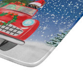 雪のクリスマスにドイツの羊飼い犬の車を運転 カッティングボード (角)