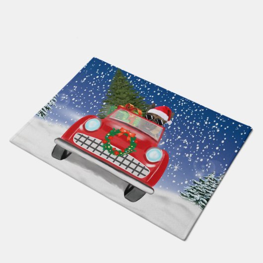 雪のクリスマスにドイツの羊飼い犬の車を運転 ドアマット (アングル)