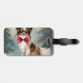 雪のクリスマスにパピロン犬 ラゲッジタグ (裏面横)