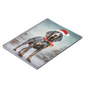 雪のクリスマスにブルーティック犬 ノートブック (左側)