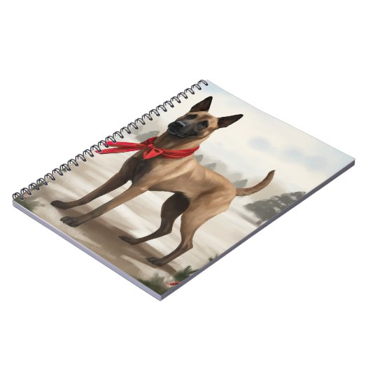 雪のクリスマスにベルギーのマリノワンドッグ ノートブック (左側)