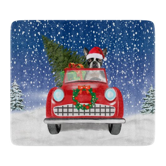 雪のクリスマスにボストンテリア犬の車を運転 カッティングボード (正面)