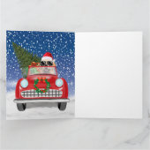 雪のクリスマスに車を運転するゴールデンレトリバー犬 カード (内部)