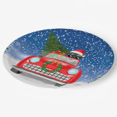 雪のクリスマスに車を運転するシュナウツァードッグ ペーパープレート (アングル)