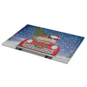 雪のクリスマスに車を運転するダルマチア犬 カッティングボード (角)