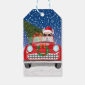 雪のクリスマスに車を運転するCorgi犬 ギフトタグ (裏面)