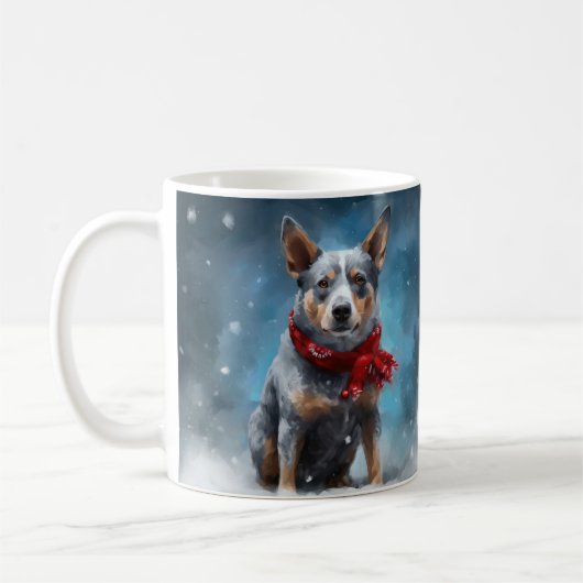 雪のクリスマスに青いヒーラー犬 コーヒーマグカップ (左)