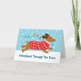 雪のクリスマスの休日によるダックスフント シーズンカード
