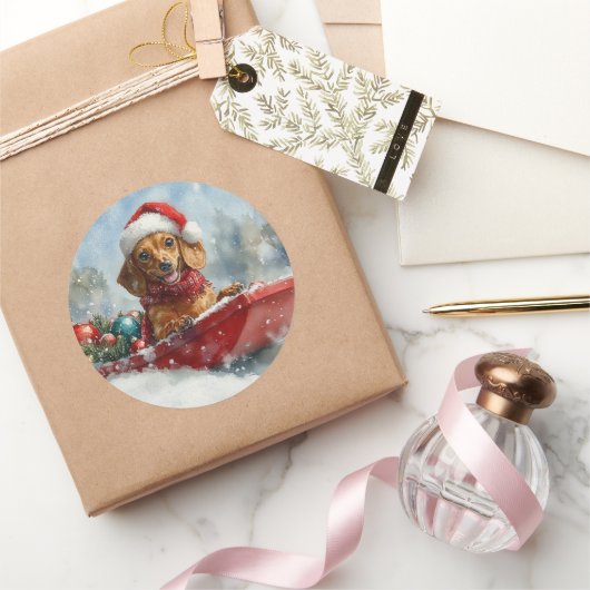 雪のクリスマスを許すそりにダックスシュント犬 ラウンドシール (ギフト)