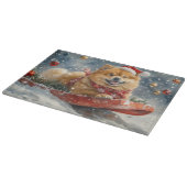 雪のクリスマスを許すそりにチョウの犬 カッティングボード (角)