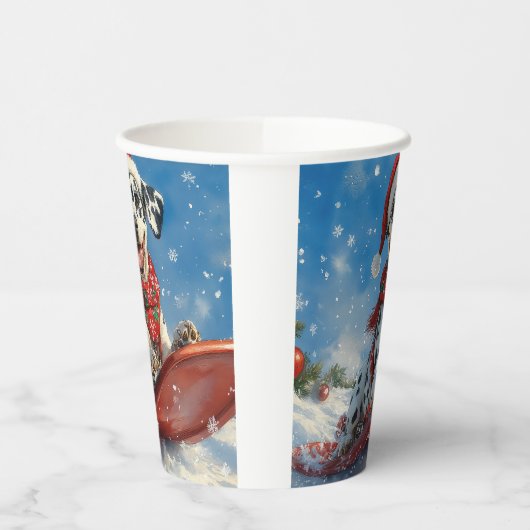 雪のクリスマスを許すそりのダルマチア犬 紙コップ (左)