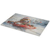 雪のクリスマスを許すそりのバスセットハウンド犬 カッティングボード (角)