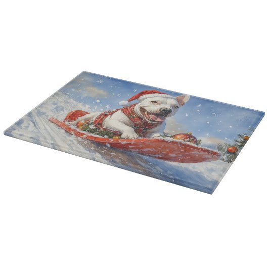 雪のクリスマスを許すそりのブルテリア犬 カッティングボード (角)