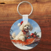 雪のクリスマスを許すそりのプードル犬 キーホルダー (裏面)