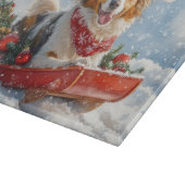 雪のクリスマスを許すそりのラフなコリー犬 カッティングボード (角)