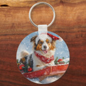雪のクリスマスを許すそりのラフなコリー犬 キーホルダー (正面)