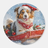 雪のクリスマスを許すそりのラフなコリー犬 マグネット (正面)