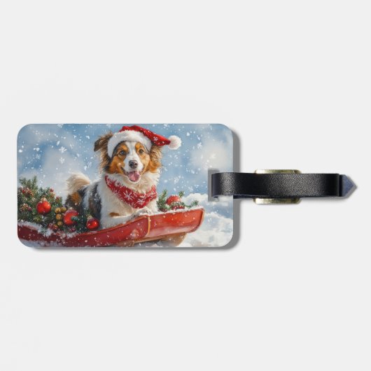 雪のクリスマスを許すそりのラフなコリー犬 ラゲッジタグ (裏面横)