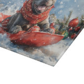 雪のクリスマスを許すそりの杖のコルソ犬 カッティングボード (角)