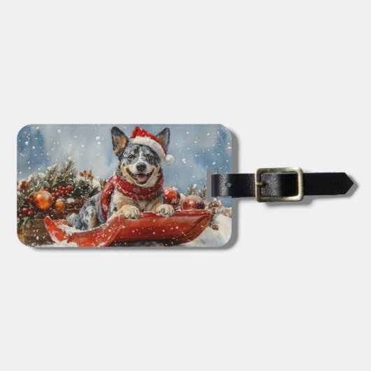 雪のクリスマスを許すそりの青いヒーラー犬 ラゲッジタグ (正面横)