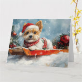 雪のクリスマスを許可するスレッジのバイワーテリア犬 カード (黄色い花)