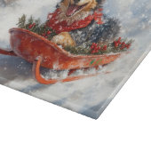 雪のクリスマスを許可するスロッジのベルギーシェパード カッティングボード (角)