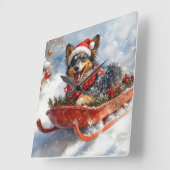 雪のクリスマスを許可するスロッジのベルギーシェパード スクエア壁時計 (傾斜)